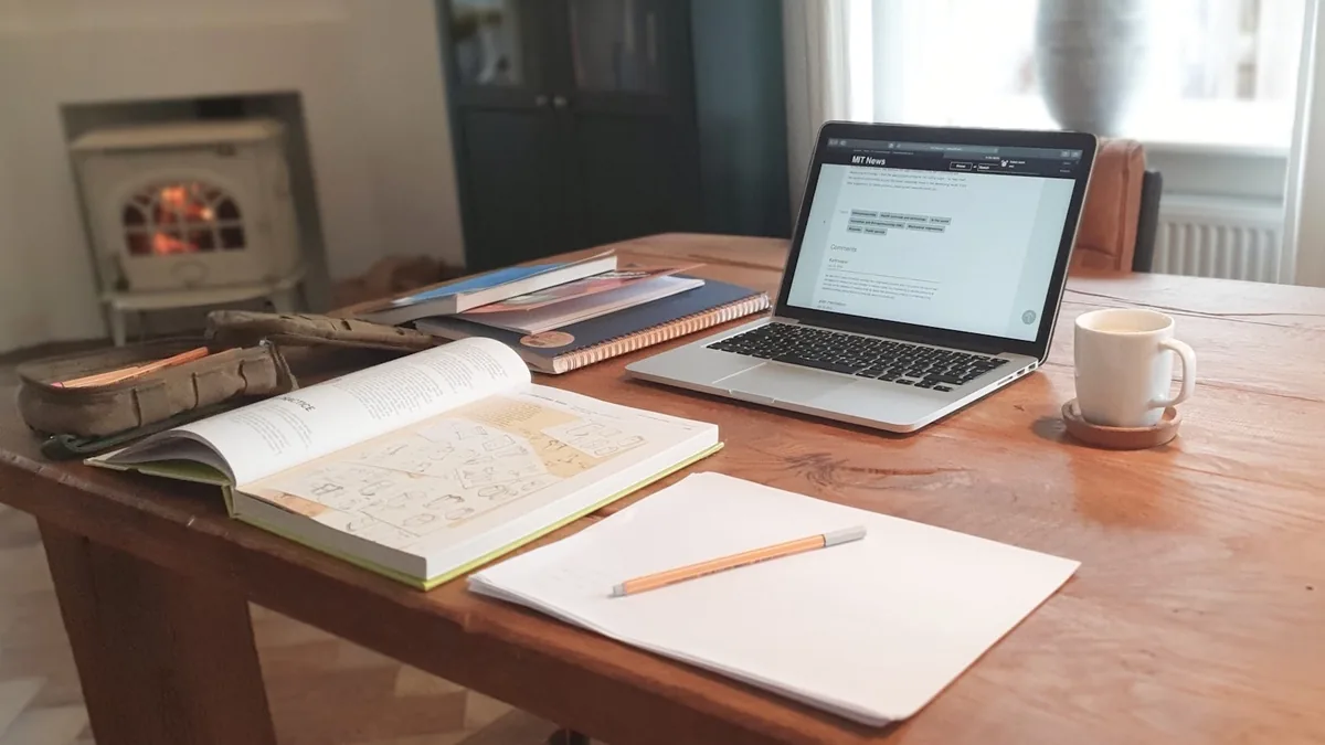 A manuscript being drafted on a laptop